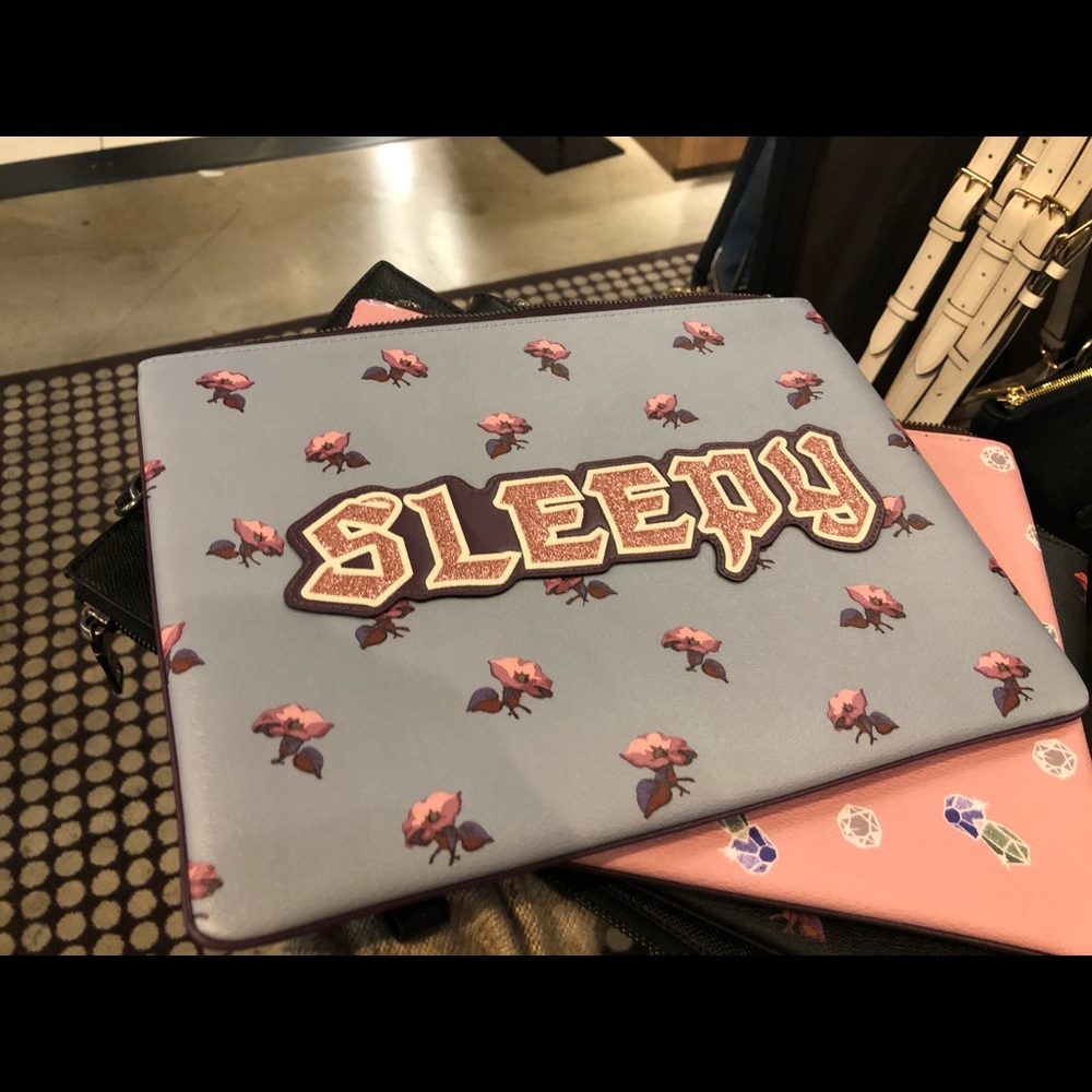 New DISNEY X COACH LARGE WRISTLET 30 WITH SLEEPY